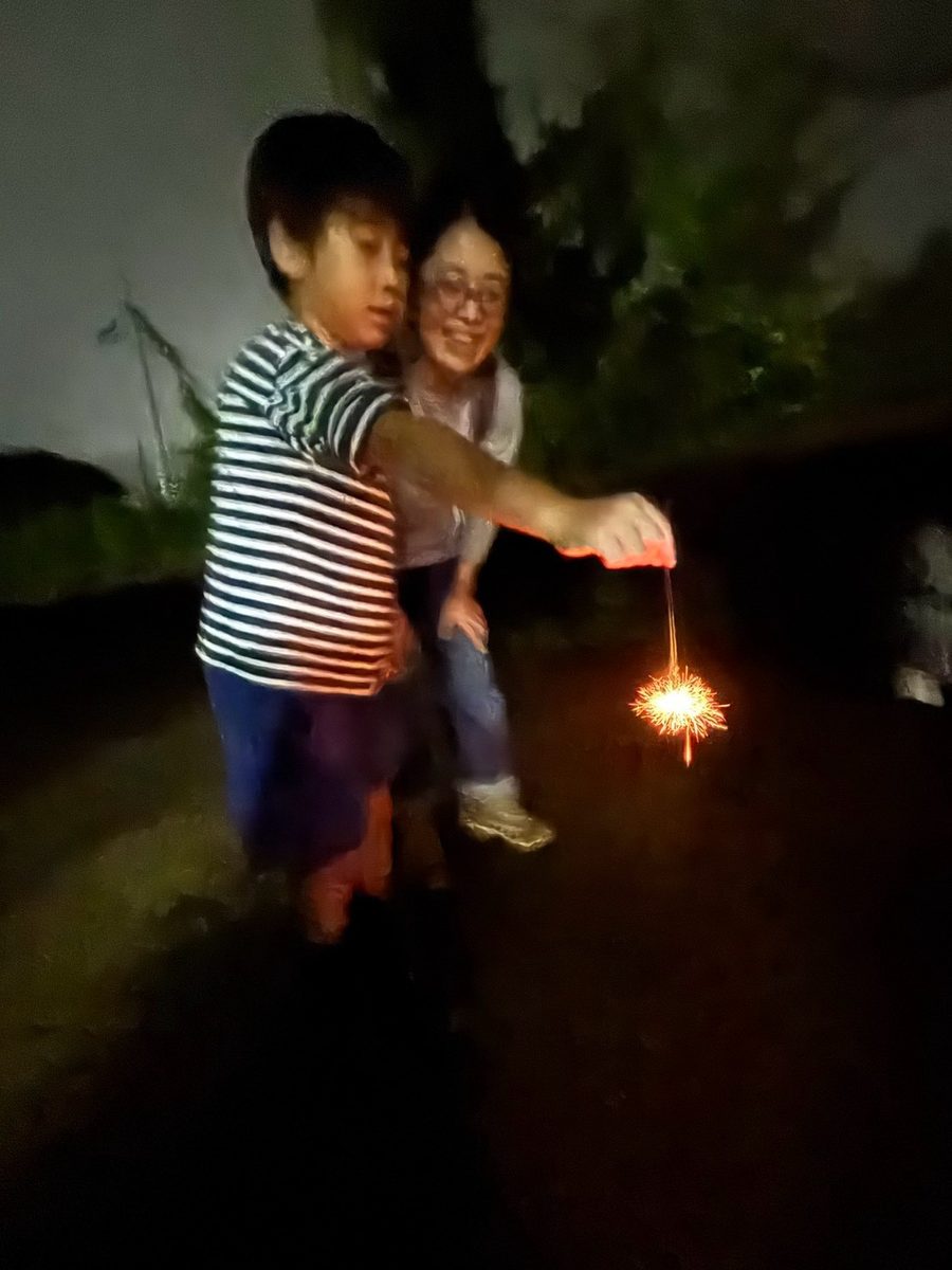 Sparklers, parent and child